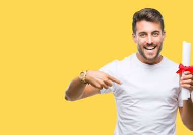 Yakışıklı delikanlı derecesi sürpriz yüz işaret parmağı kendini izole arka plan üzerinde tutan