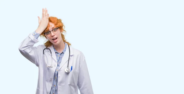 Young Redhead Woman Wearing Doctor Uniform Surprised Hand Head Mistake — Stock Photo, Image