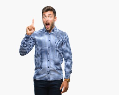 Yakışıklı delikanlı ile başarılı fikir parmağı yukarıyı izole arka plan üzerinde. Çıktıktan ve mutlu. Bir numara.