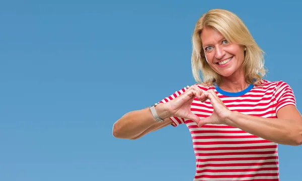 Middle Age Blonde Woman Isolated Background Smiling Love Showing Heart — Stock Photo, Image