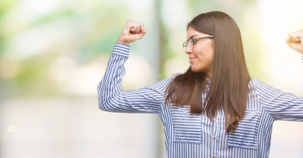 Young Beautiful Hispanic Business Woman Showing Arms Muscles Smiling Proud — Stock Photo, Image