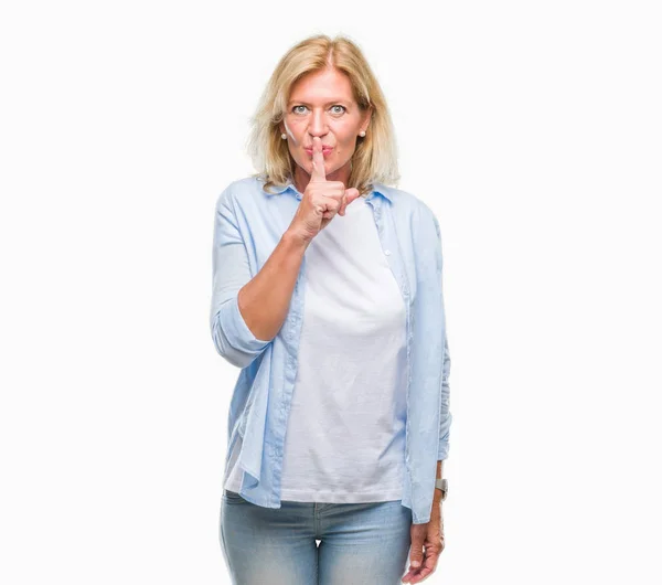 Middle Age Blonde Woman Isolated Background Asking Quiet Finger Lips — Stock Photo, Image