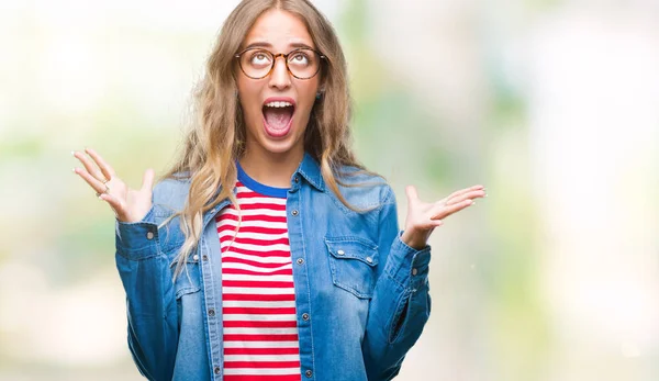 Beautiful Young Blonde Woman Wearing Glasses Isolated Background Crazy Mad — Stock Photo, Image