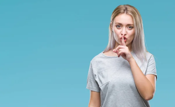 Young Blonde Woman Isolated Background Asking Quiet Finger Lips Silence — Stock Photo, Image
