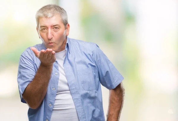 Handsome Senior Man Isolated Background Looking Camera Blowing Kiss Hand — Stock Photo, Image