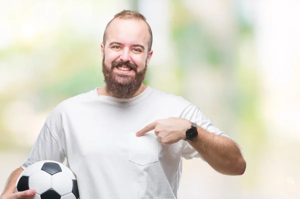 Young Caucasian Hipster Man Holding Soccer Football Ball Isolated Background — Stock Photo, Image