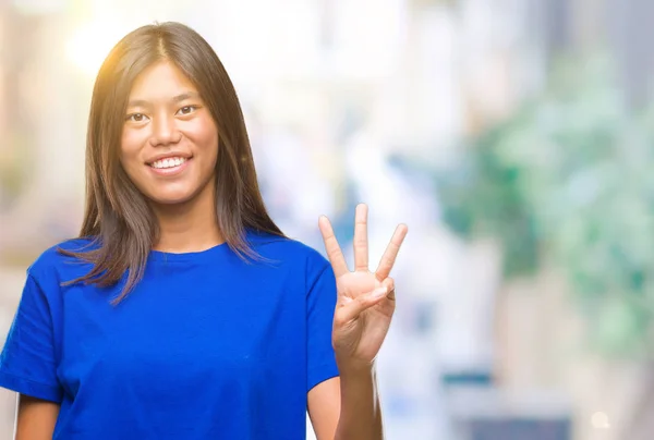 Young Asian Woman Isolated Background Showing Pointing Fingers Number Three — Stock Photo, Image