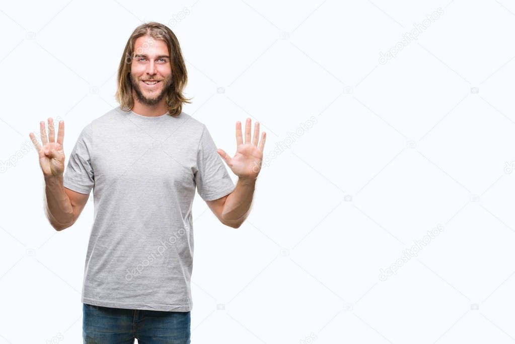 Young handsome man with long hair over isolated background showing and pointing up with fingers number nine while smiling confident and happy.