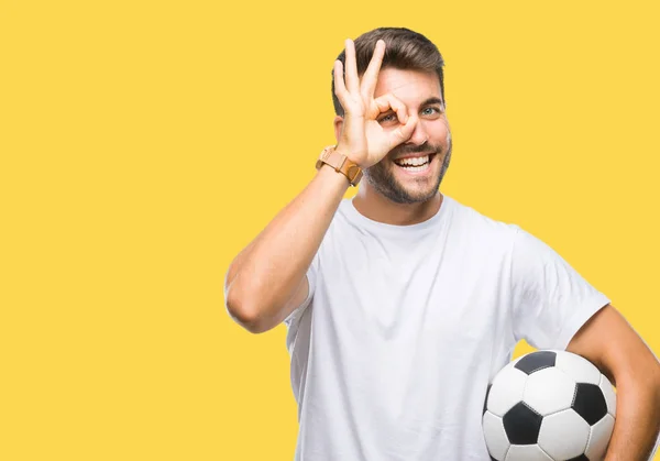 Jovem Homem Bonito Segurando Bola Futebol Sobre Fundo Isolado Com — Fotografia de Stock