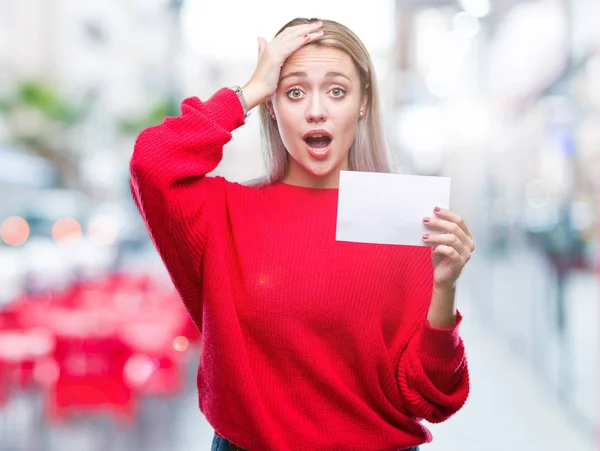 Young Blonde Woman Holding Blank Paper Card Isolated Background Stressed — Stock Photo, Image
