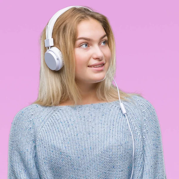 Young Caucasian Woman Listening Music Wearing Headphones Isolated Background Looking — Stock Photo, Image