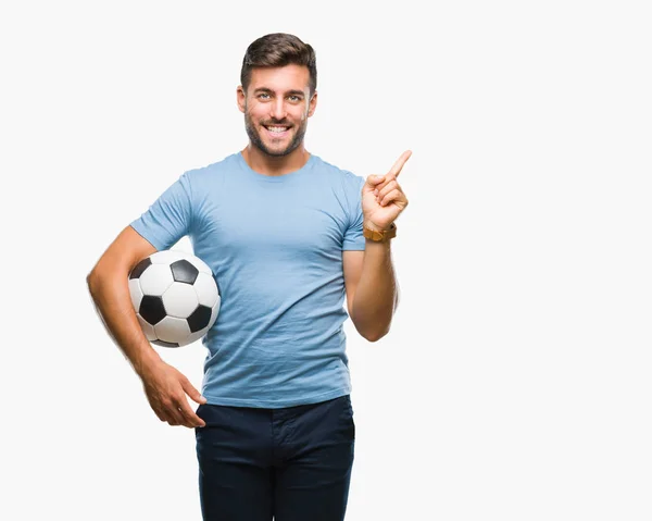 Joven Hombre Guapo Sosteniendo Pelota Fútbol Sobre Fondo Aislado Muy —  Fotos de Stock