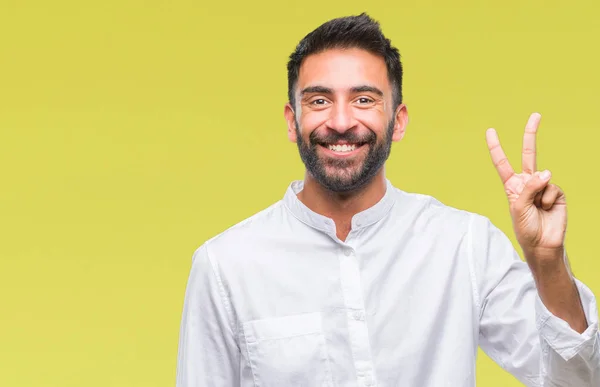 成年西班牙裔男子在孤立的背景显示和指向的手指第二 而微笑着自信和快乐 — 图库照片