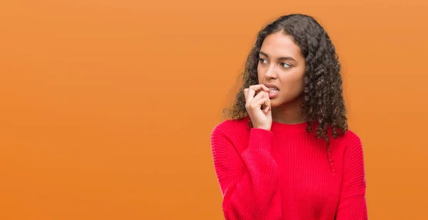 Jonge Spaanse Vrouw Dragen Rode Trui Zoek Gestresst Nerveus Met — Stockfoto