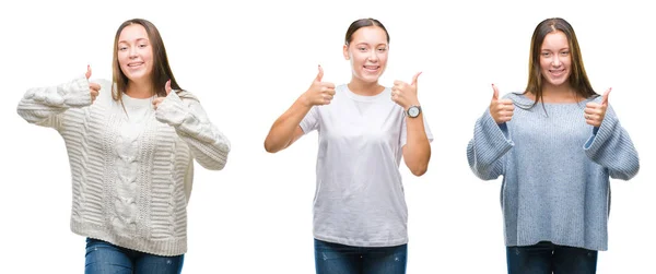 年轻美丽的女孩穿着冬季毛衣在白色孤立的背景成功标志做积极的手势用手 竖起大拇指微笑和快乐 带着欢快的表情 获胜者的手势看着镜头 — 图库照片