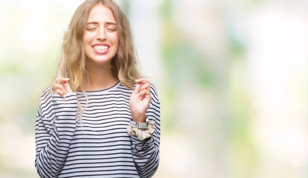 Schöne Junge Blonde Frau Streifen Pullover Über Isoliertem Hintergrund Lächelnd — Stockfoto