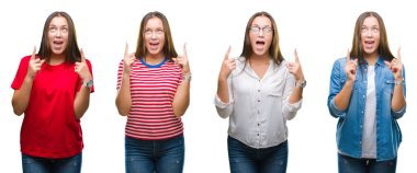 Genç güzel kız beyaz izole arka plan üzerinde kolaj hayrete ve yukarıya bakıyor ve parmakları ile işaret ve silah kaldırdı şaşırttı.