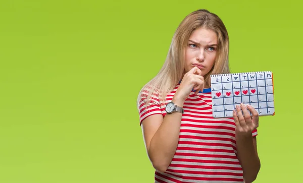 Jonge Kaukasische Vrouw Houdt Van Menstruatie Kalender Geïsoleerde Achtergrond Ernstige — Stockfoto