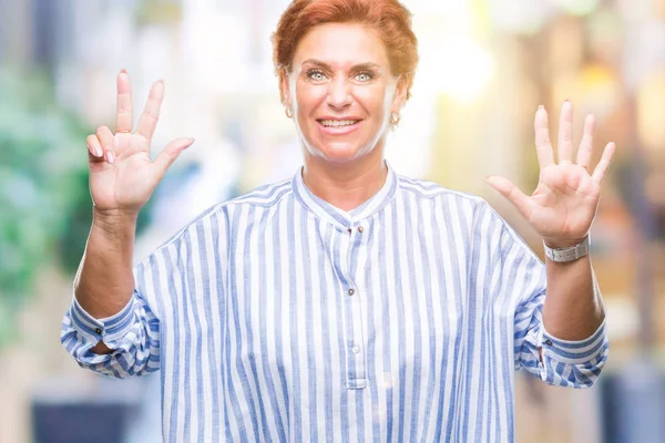 Atrractive Senior Caucasian Redhead Woman Isolated Background Showing Pointing Fingers — Stock Photo, Image