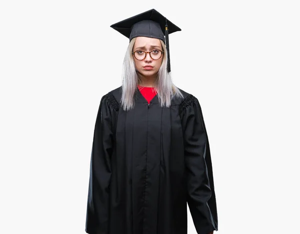 Jonge Blonde Vrouw Afgestudeerde Uniform Dragen Geïsoleerde Achtergrond Depressief Bang — Stockfoto