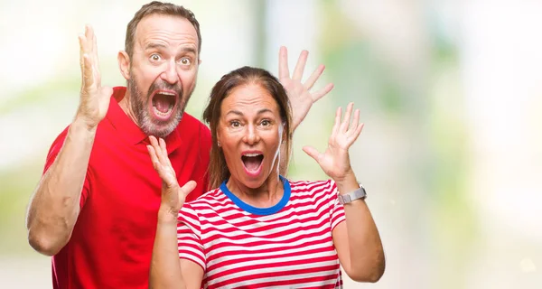 Middle Age Hispanic Couple Love Isolated Background Celebrating Crazy Amazed — Stock Photo, Image