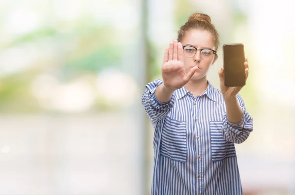 Giovane Donna Bionda Utilizzando Smartphone Mano Aperta Facendo Stop Segno — Foto Stock