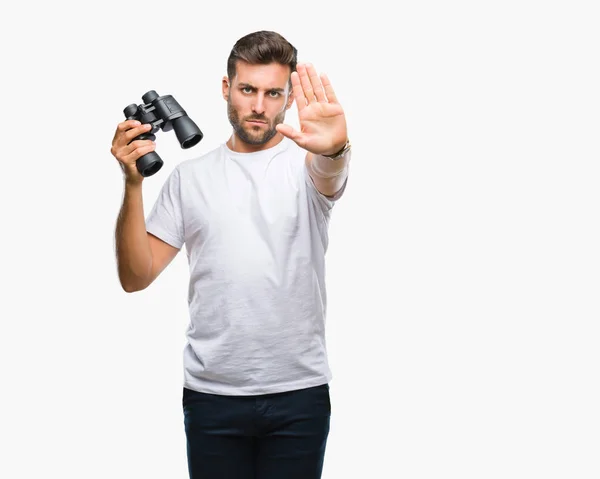 Young Handsome Man Looking Binoculars Isolated Background Open Hand Doing — Stock Photo, Image