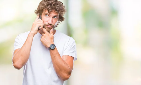 Hombre Hispano Guapo Modelo Hablando Teléfono Inteligente Sobre Fondo Aislado —  Fotos de Stock