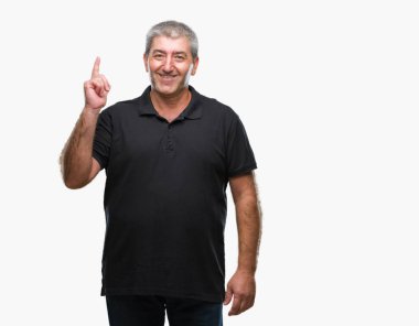 Başarılı fikirle parmağı yukarıyı izole arka plan üzerinde yakışıklı komuta sizde. Çıktıktan ve mutlu. Bir numara.