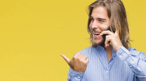 Young Handsome Man Long Hair Isolated Background Talking Phone Pointing — Stock Photo, Image