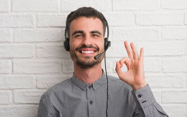 Young Adult Man Brick Wall Working Operator Doing Sign Fingers — Stock Photo, Image