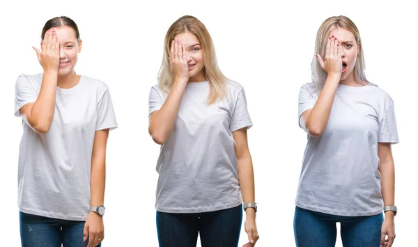 一群年轻女性在孤立的背景上穿着白色 用一只眼睛 脸上带着自信的微笑 带着惊讶的情绪 — 图库照片