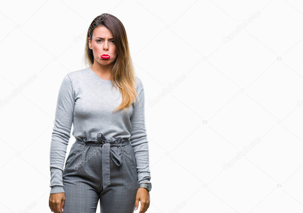 Young beautiful worker business woman over isolated background depressed and worry for distress, crying angry and afraid. Sad expression.
