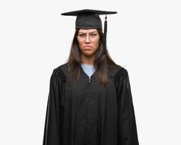 Jovem Hispânica Vestindo Boné Graduado Uniforme Cético Nervoso Franzindo Testa — Fotografia de Stock