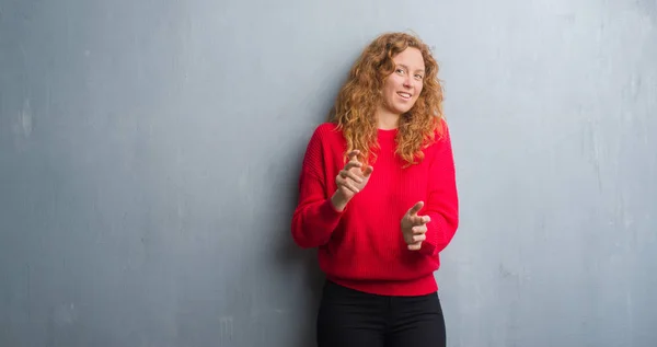 Young Redhead Woman Grey Grunge Wall Wearing Red Sweater Disgusted — Stock Photo, Image