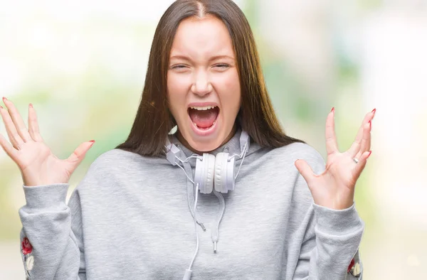 Junge Schöne Kaukasische Studentin Mit Kopfhörern Über Isoliertem Hintergrund Die — Stockfoto