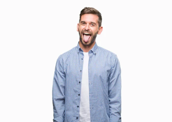 若いハンサムな男の舌を付着分離の背景の上の身に着けている白い シャツを面白い表現に満足 感情の概念 — ストック写真