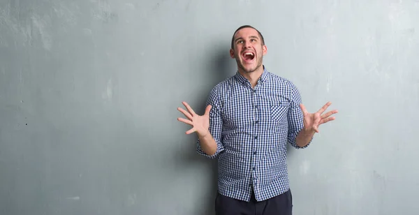 Young Caucasian Man Grey Grunge Wall Crazy Mad Shouting Yelling — Stock Photo, Image