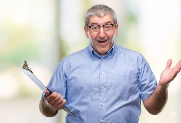 Handsome Senior Inspector Man Holding Clipboard Isolated Background Very Happy — Stock Photo, Image