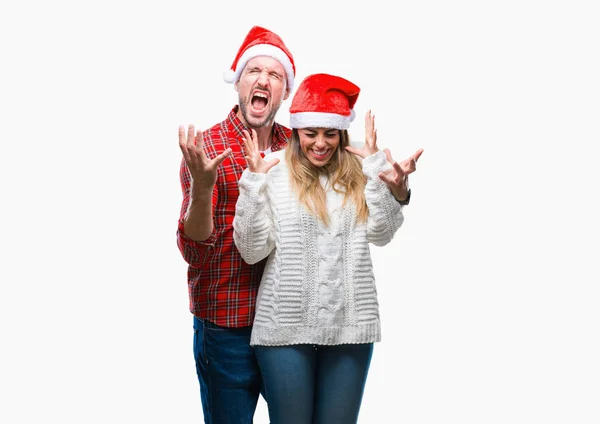 Junges Verliebtes Paar Mit Weihnachtsmütze Vor Isoliertem Hintergrund Das Verrückt — Stockfoto