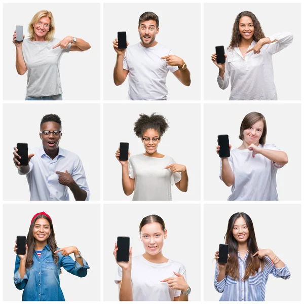 Collage of group of young people showing screen of smartphone over isolated background with surprise face pointing finger to himself
