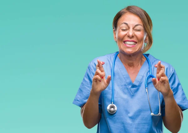 Enfermera Médica Mediana Edad Sobre Fondo Aislado Sonriendo Cruzando Los — Foto de Stock