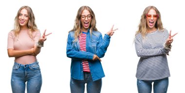 Rahat giyen genç güzel genç kadın mutlu yüz zafer işareti yaparken kameraya göz kırpıyor ile gülümseyen beyaz izole arka plan bakın. İki numaralı.