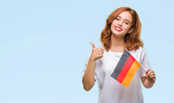 Młoda Kobieta Piękny Przytrzymanie Banderą Niemiec Białym Tle Szczęśliwy Uśmiechem — Zdjęcie stockowe