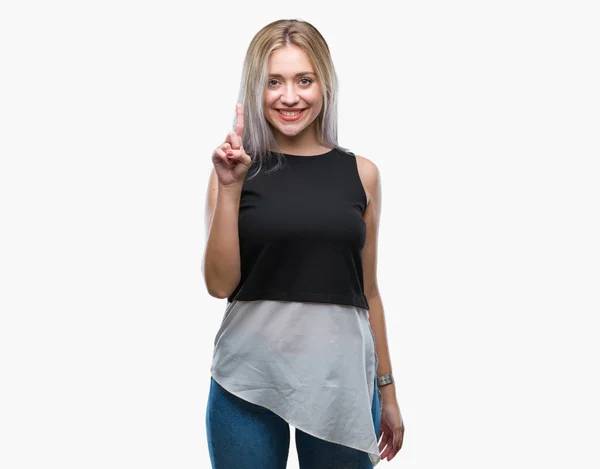 Young Blonde Woman Isolated Background Showing Pointing Finger Number One — Stock Photo, Image