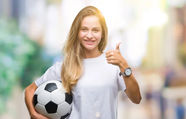 Jovem Bela Mulher Loira Segurando Bola Futebol Sobre Fundo Isolado — Fotografia de Stock