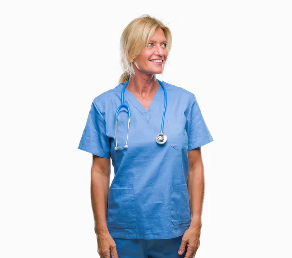 Middle Age Blonde Nurse Surgeon Doctor Woman Isolated Background Looking — Stock Photo, Image