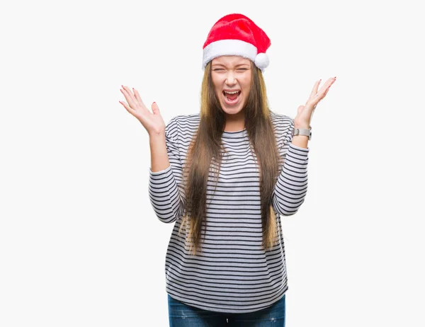 若い美しい白人女性にクリスマスの帽子をかぶっては 背景を祝う怒って叫んで調達とクローズの目が興奮して腕を成功のために狂気を分離しました 勝者の概念 — ストック写真