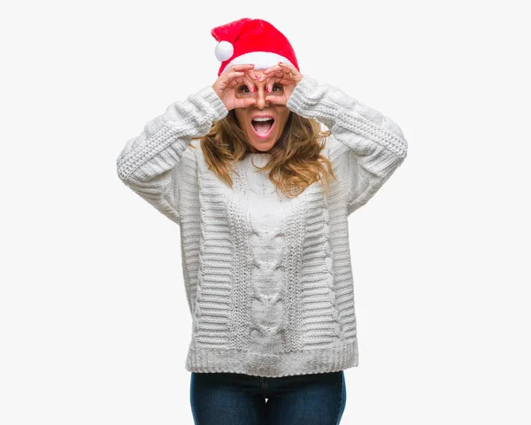 Middelbare Leeftijd Senior Spaanse Vrouw Kerstmuts Dragen Geïsoleerde Achtergrond Doen — Stockfoto