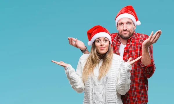 Giovane Coppia Innamorata Indossa Cappello Natale Sfondo Isolato Espressione Indiscreta — Foto Stock